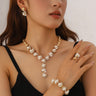 belvoraringelite - S-Shaped Wave-Shaped Pearl And Diamond Jewelry Set, Vintage Style Light Luxury Necklace, Earrings, Ring, And Bracelet Four-Piece Set